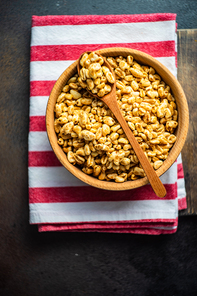 Breakfast concept with corn flakes in a bowl with copy space