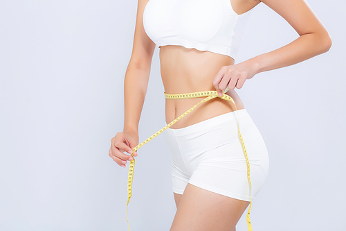 Asian woman diet and slim with measuring waist for weight isolated on white, girl have cellulite and calories loss with tape measure, health and wellness concept.