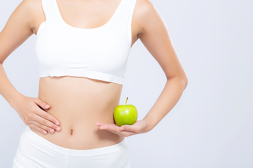 beautiful body woman  slim holding green apple with cellulite for wellness, girl with fitness for weight loss and healthy isolated on white, healthcare and diet concept.