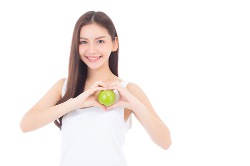 Beautiful of portrait young asian woman smile and holding green apple fruit with heart shape wellness and healthy isolated on white.