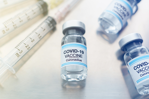 Needles and syringes in the tray for prevention and treatment from corona virus infection (Covid-19).