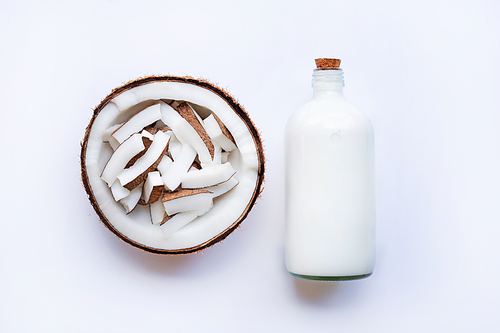 Coconut and coconut milk on white background.