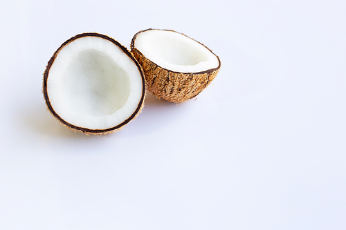 Ripe coconuts on white background. Copy space