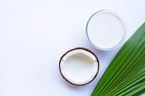 Coconut  with coconut milk on white background.