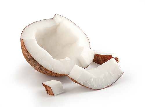 Fresh isolated pieces of coconut on the white background