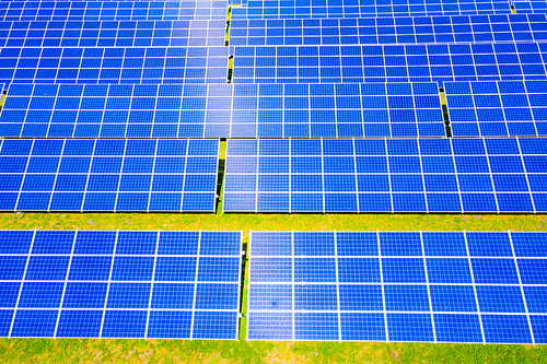 Renewable Energy and Sustainable Development / Park of Photovoltaic Solar Panels . Aerial view of Solar panels Photovoltaic systems industrial landscape