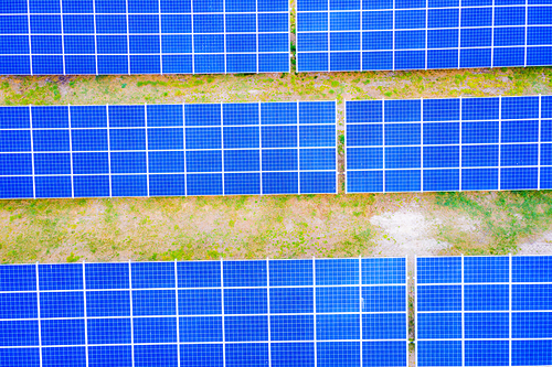 Solar panel, photovoltaic, alternative electricity source - concept of sustainable resources. Aerial view of Solar panels Photovoltaic systems industrial landscape