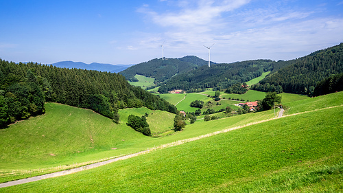 An image of a landscape with wind energy in the black forest area Germany