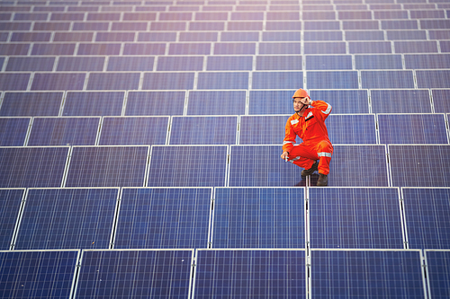 Engineers are checking the solar panel for maintenance. And clean the solar panel is always available.