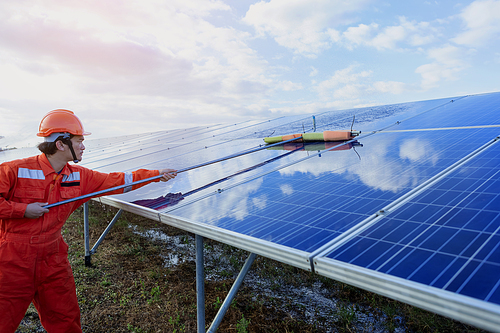 Engineers are checking the solar panel for maintenance. And clean the solar panel is always available.