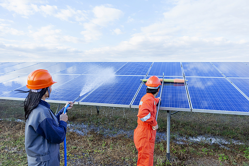 Engineers are checking the solar panel for maintenance. And clean the solar panel is always available.