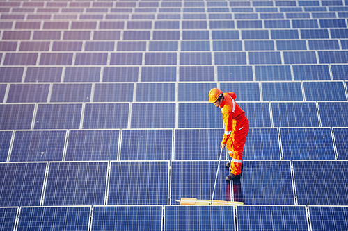 Engineers are checking the solar panel for maintenance. And clean the solar panel is always available.