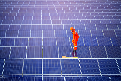 Engineers are checking the solar panel for maintenance. And clean the solar panel is always available.