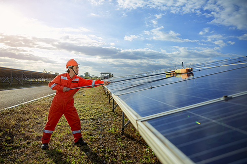 Engineers are checking the solar panel for maintenance. And clean the solar panel is always available.