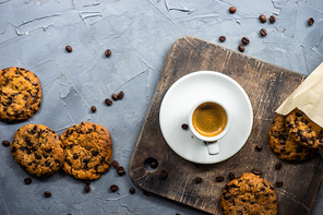 Homemade cookies with chocolate and coffee on rustic background with copy space
