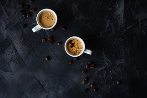Cup of coffee and good morning note on wooden background with copy space