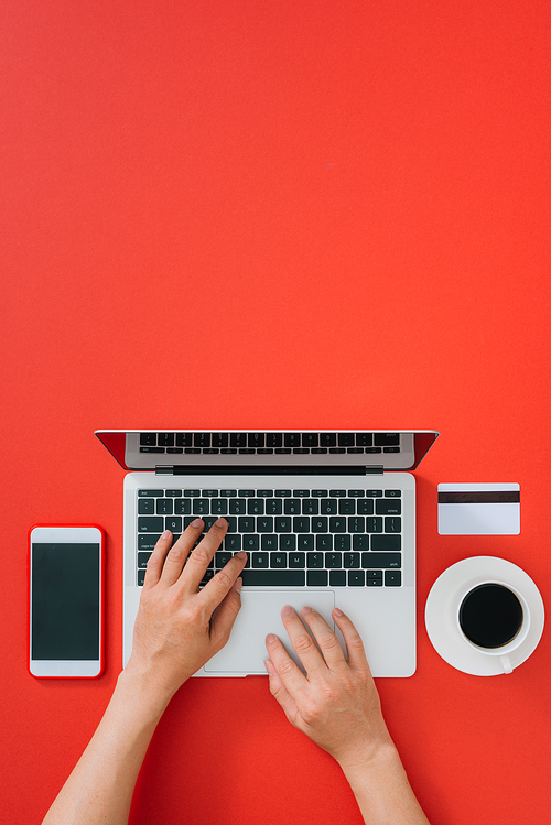 Top view of male hands making online payment. Holiday shopping.