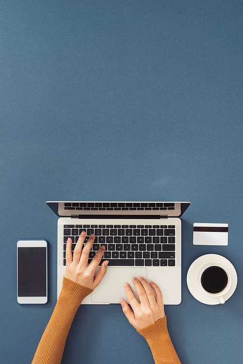 close up of businessman working on laptop.