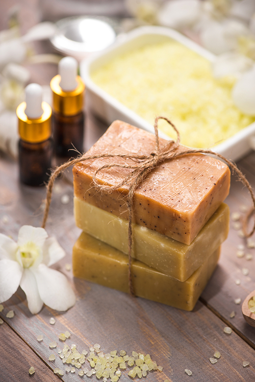 Handmade Soap and Aroma Oil with Flower branch. Spa products.