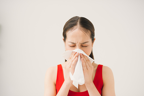 A Woman catches a cold, illness, asian