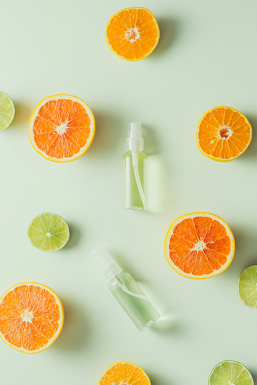 Flat lay composition with delicious natural citrus on color background