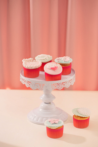 Many yummy cupcakes. Valentine sweet love cupcake on table on light background