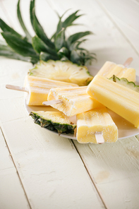 Homemade popsicles made of pineapple