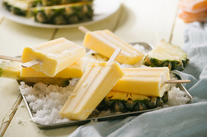 Homemade popsicles made of pineapple