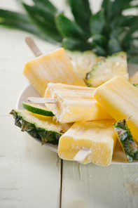 Homemade popsicles made of pineapple