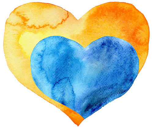 A small blue heart in a large yellow
