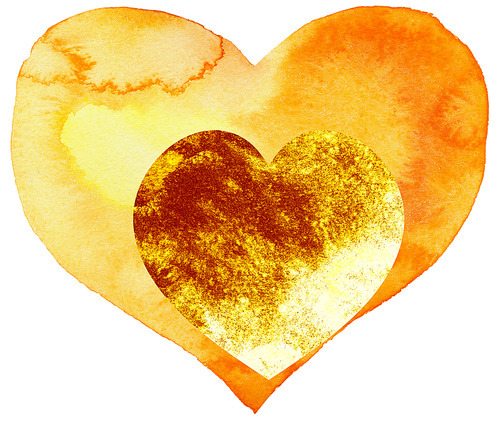 A small golden heart in a large yellow