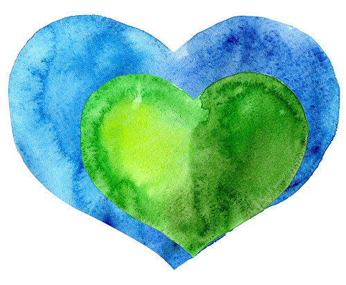A small green heart in a large blue