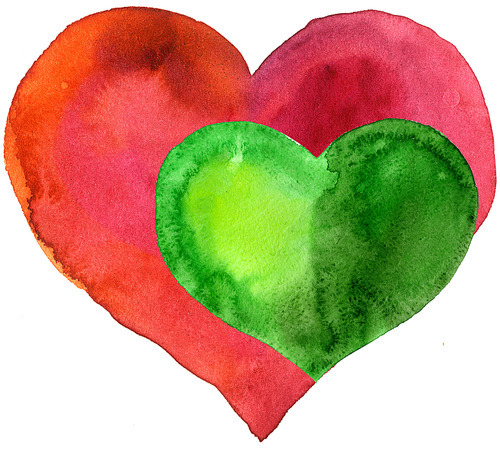 A small green heart in a large red