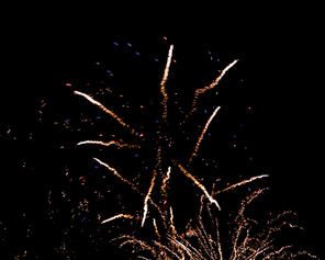 Flashes and sparks from fireworks isolated on black background.