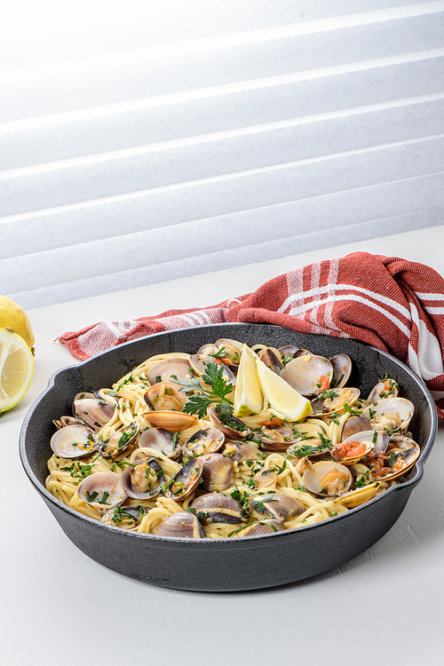 Traditional italian seafood pasta with clams Spaghetti alle Vongole.