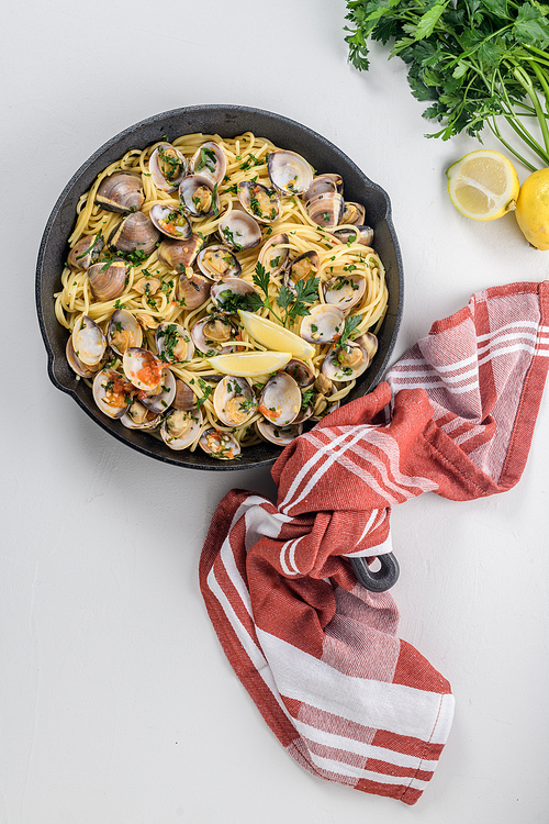 Traditional italian seafood pasta with clams Spaghetti alle Vongole.