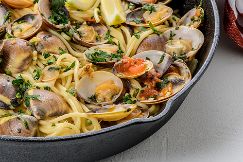 Traditional italian seafood pasta with clams Spaghetti alle Vongole.