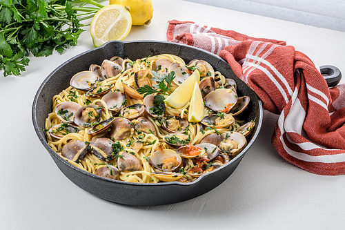 Traditional italian seafood pasta with clams Spaghetti alle Vongole.