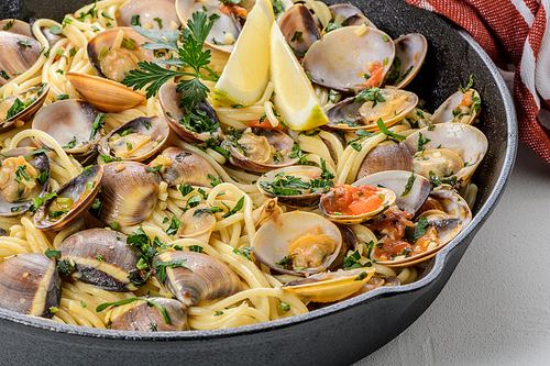 Traditional italian seafood pasta with clams Spaghetti alle Vongole.