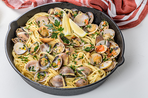 Traditional italian seafood pasta with clams Spaghetti alle Vongole.
