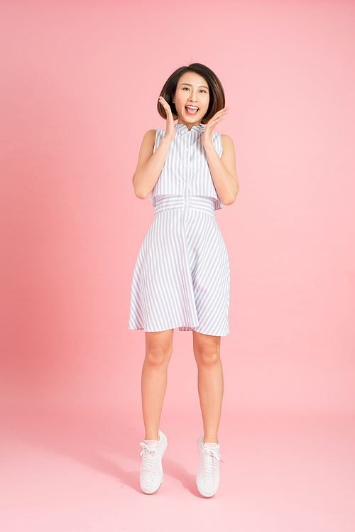 Vertical full length body size studio photo portrait of cute cool free fresh charming pretty attractive lady in light blue clothing feeling expressing happiness isolated bright pastel soft background