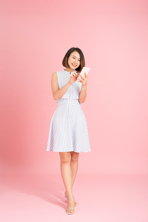 Young woman using mobile phone