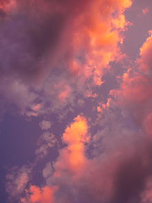 Background of sunset sky and clouds in blue and pink colors.