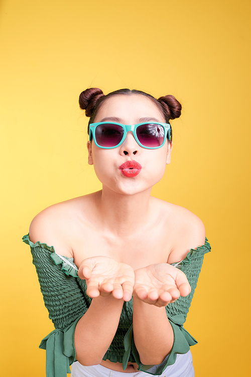 Fashionable asian woman in trendy sunglasses