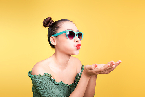 Fashionable asian woman in trendy sunglasses