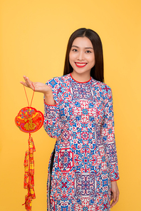 Vietnamese woman holding attributes. Tet holiday. Lunar New Year. Text mean Happiness