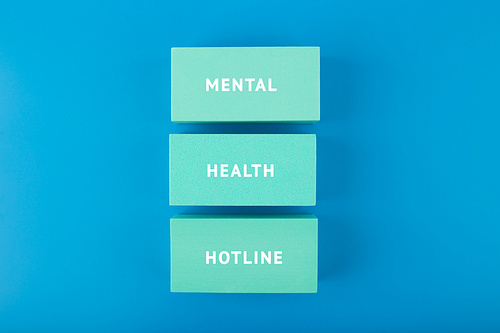 Mental health hotline minimal concept in blue monochromatic colors. Mental health awareness, help and assistance concept