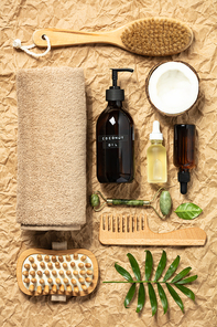 Natural cosmetic SPA products on crumpled paper background. Eco-friendly packaging, zero waste, sustainable lifestyle.