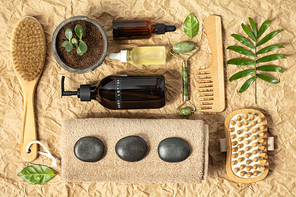 Natural cosmetic SPA products on crumpled craft paper background. Eco-friendly packaging, zero waste, sustainable lifestyle.