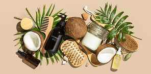 Coconut oil and natural cosmetic products, hair, face and body treatment, massage and spa concept, flat lay, top view